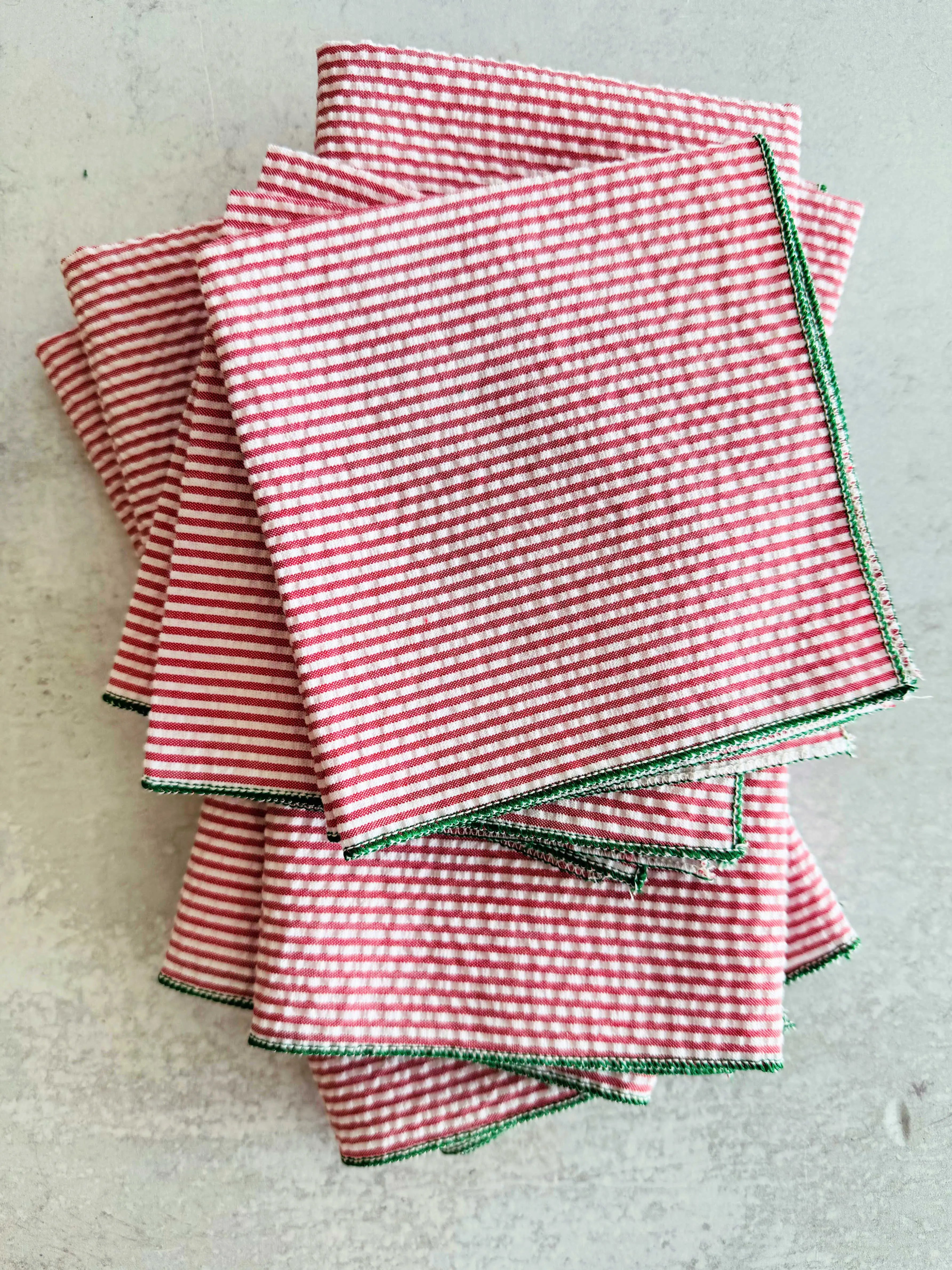 Red and white seersucker napkins with green trim