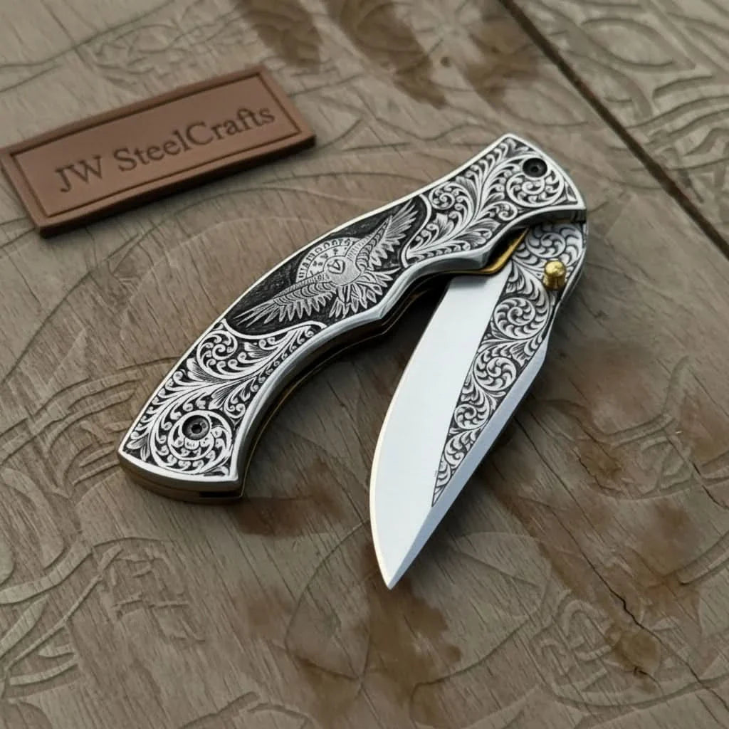 Hand Engraved Folding Knife — Eagle Motif Stainless Steel Scales, Mirror Polish Blade, Liner Lock, Wooden Box & Viking Rune Bracelet