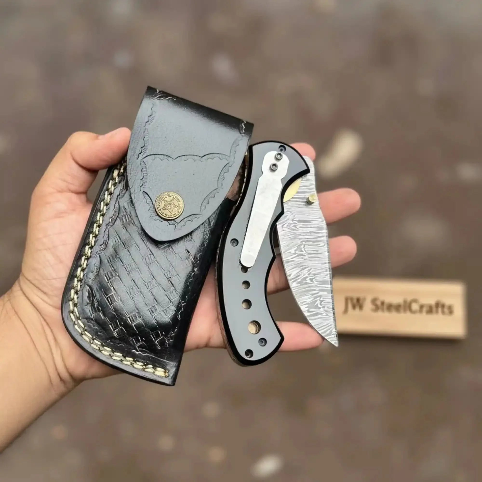 Damascus Steel Folding Pocket Knife — Recurve Clip Point Blade, Black Resin Handle, Pocket Clip & Cowhide Leather Sheath by JW SteelCrafts, leather knife sheath main product photo