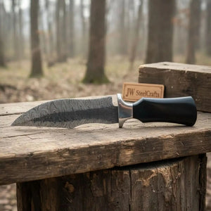 Damascus Trailing Point Fixed Blade Hunting Knife — Forged Ladder Pattern Blade, Black Resin Handle & Steel Guard
