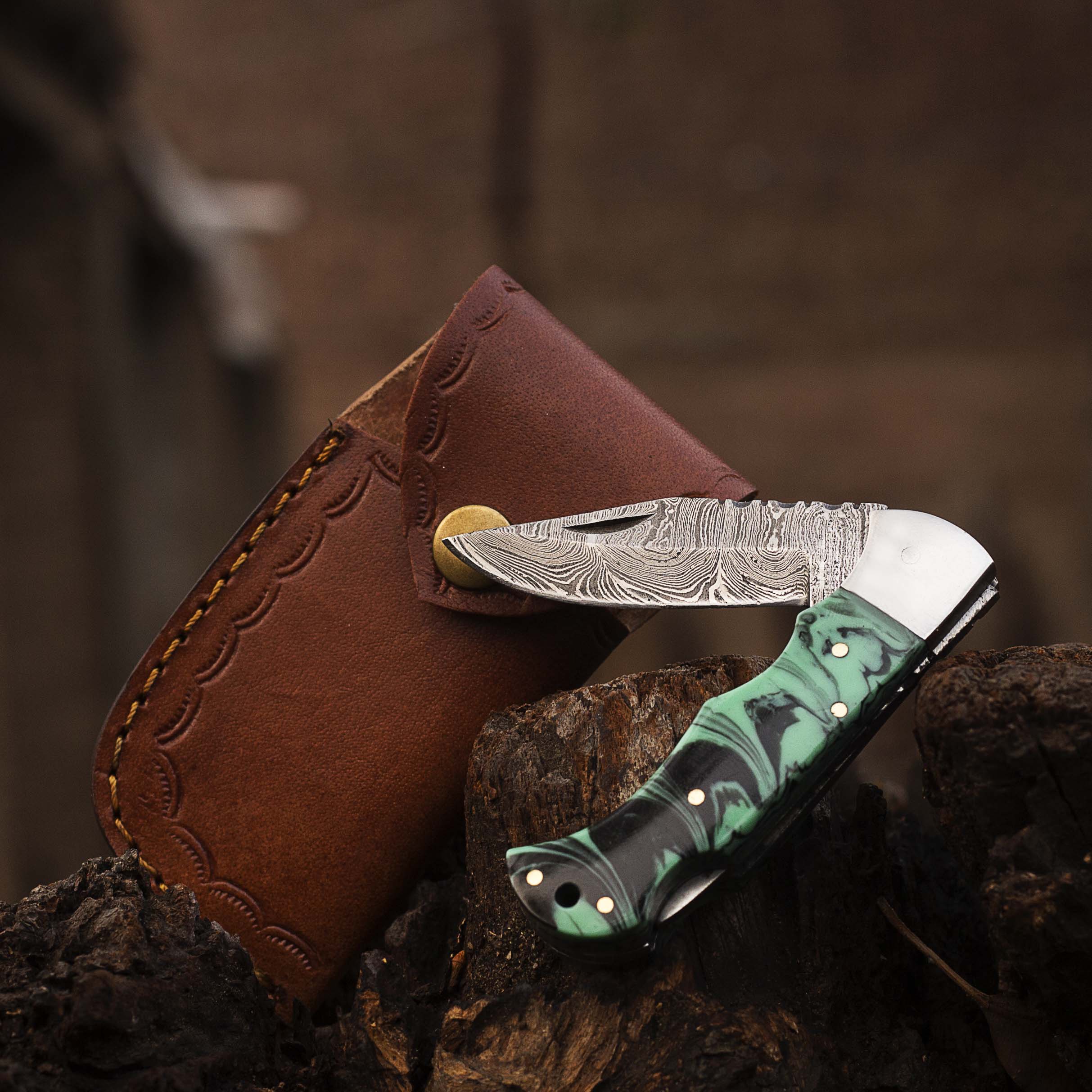 Damascus steel Folding Pocket Knife with Resin Handle by Teton Twist Knives – view 1