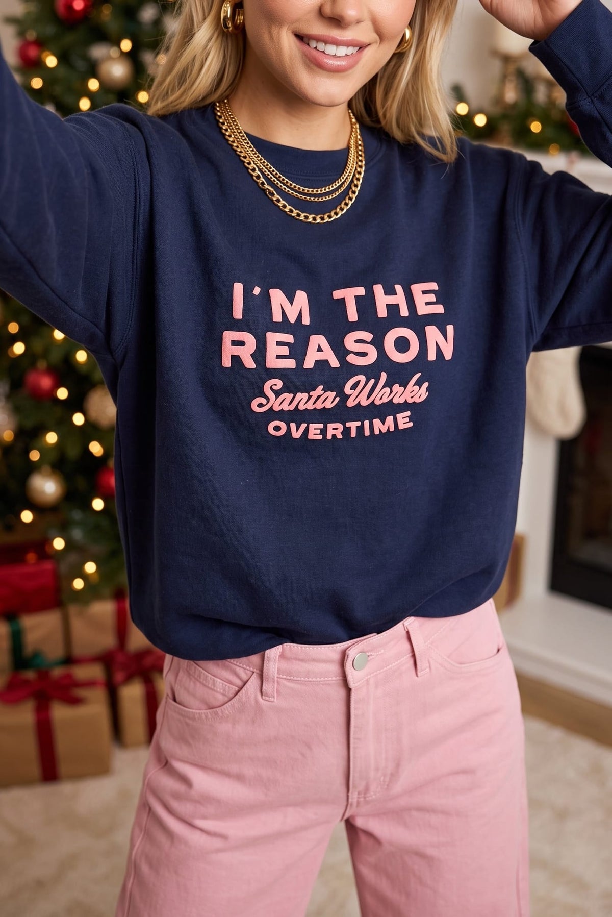 I'm the Reason Santa Works Overtime Sweatshirt by Southern Bliss Company