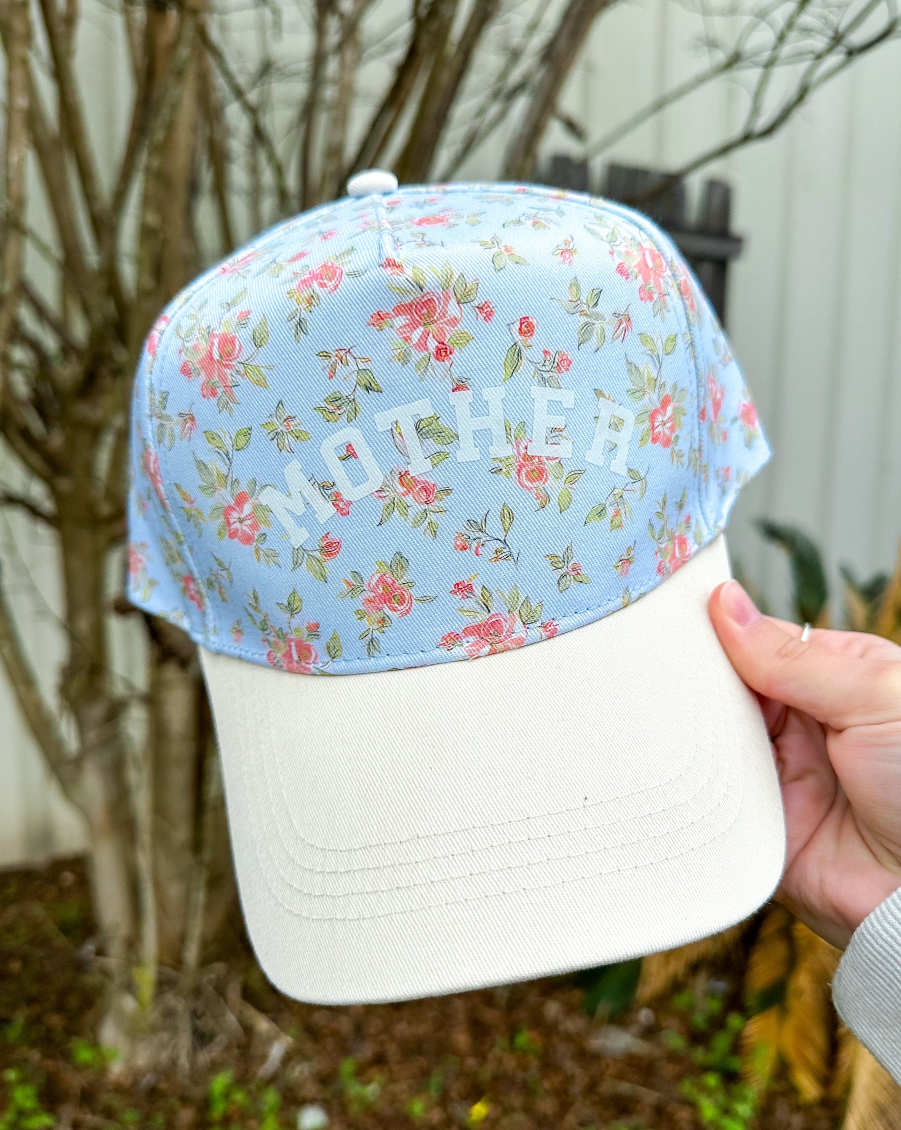Mother Floral Coral/ Light Blue Trucker Hat by Southern Bliss Company, Southern lifestyle apparel main product photo