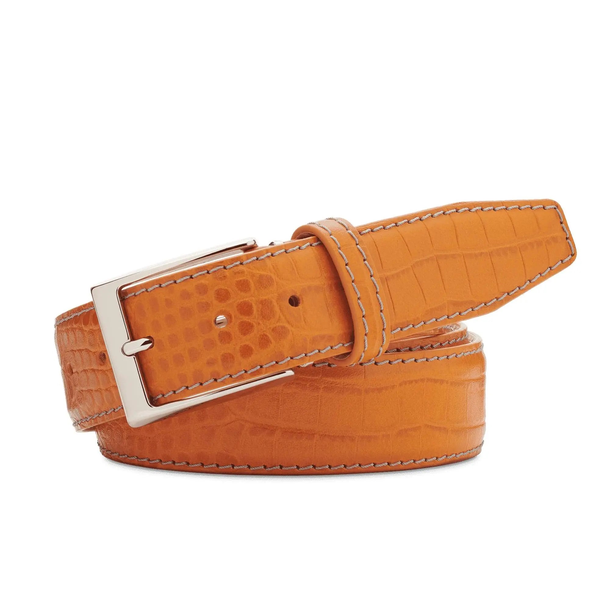 Close up of orange mock croc leather belt texture