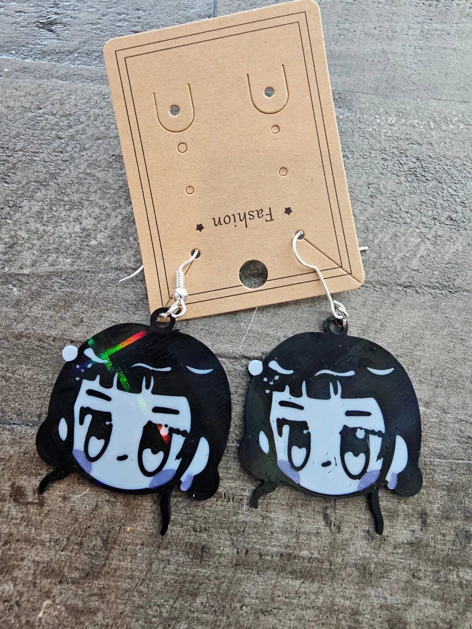 K-POP Demon Hunter Zoey Earrings: Anime Chibi Style, Black & Gray. Main Street Collective.