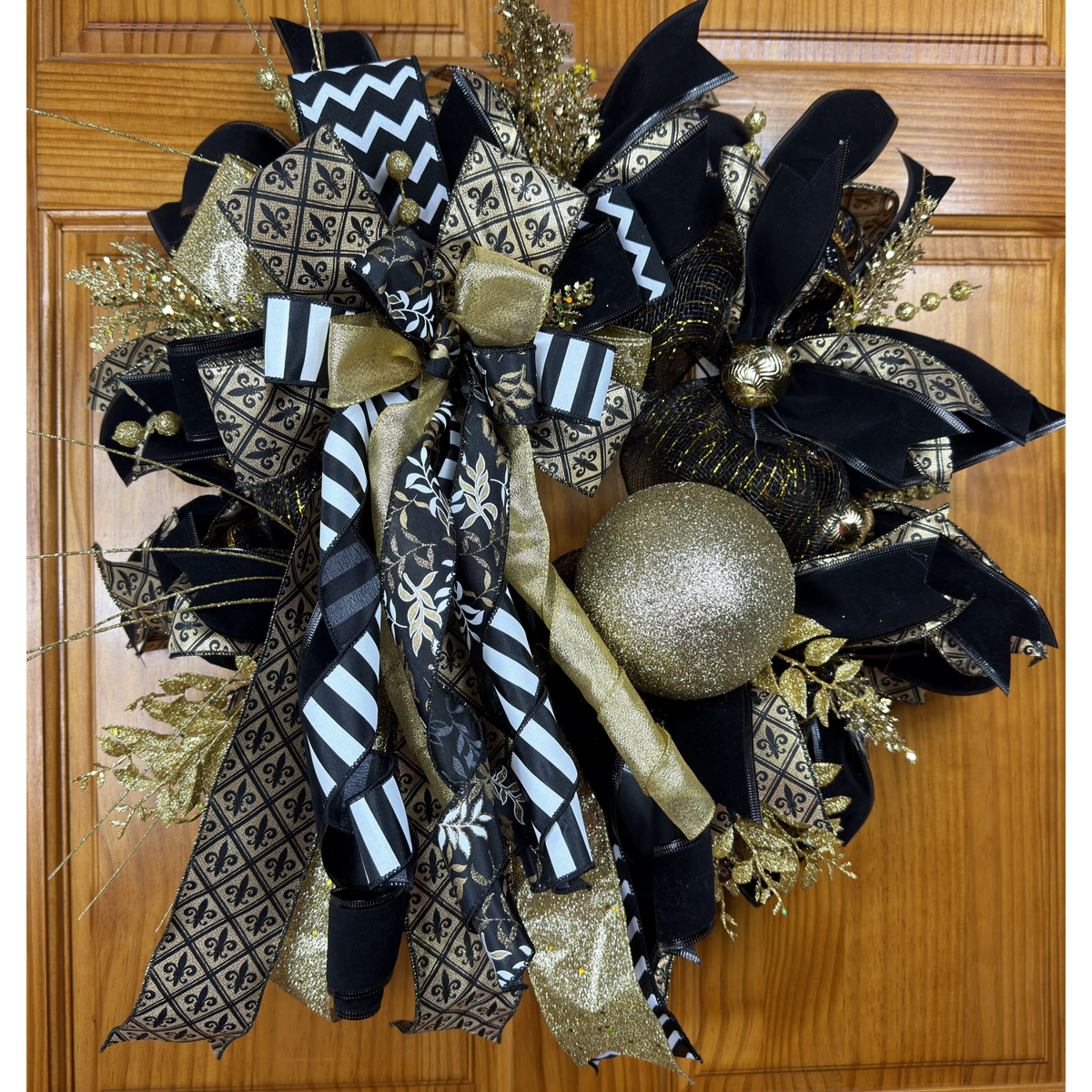 Black and gold fleur-de-lis Christmas wreath by Bouge Creations