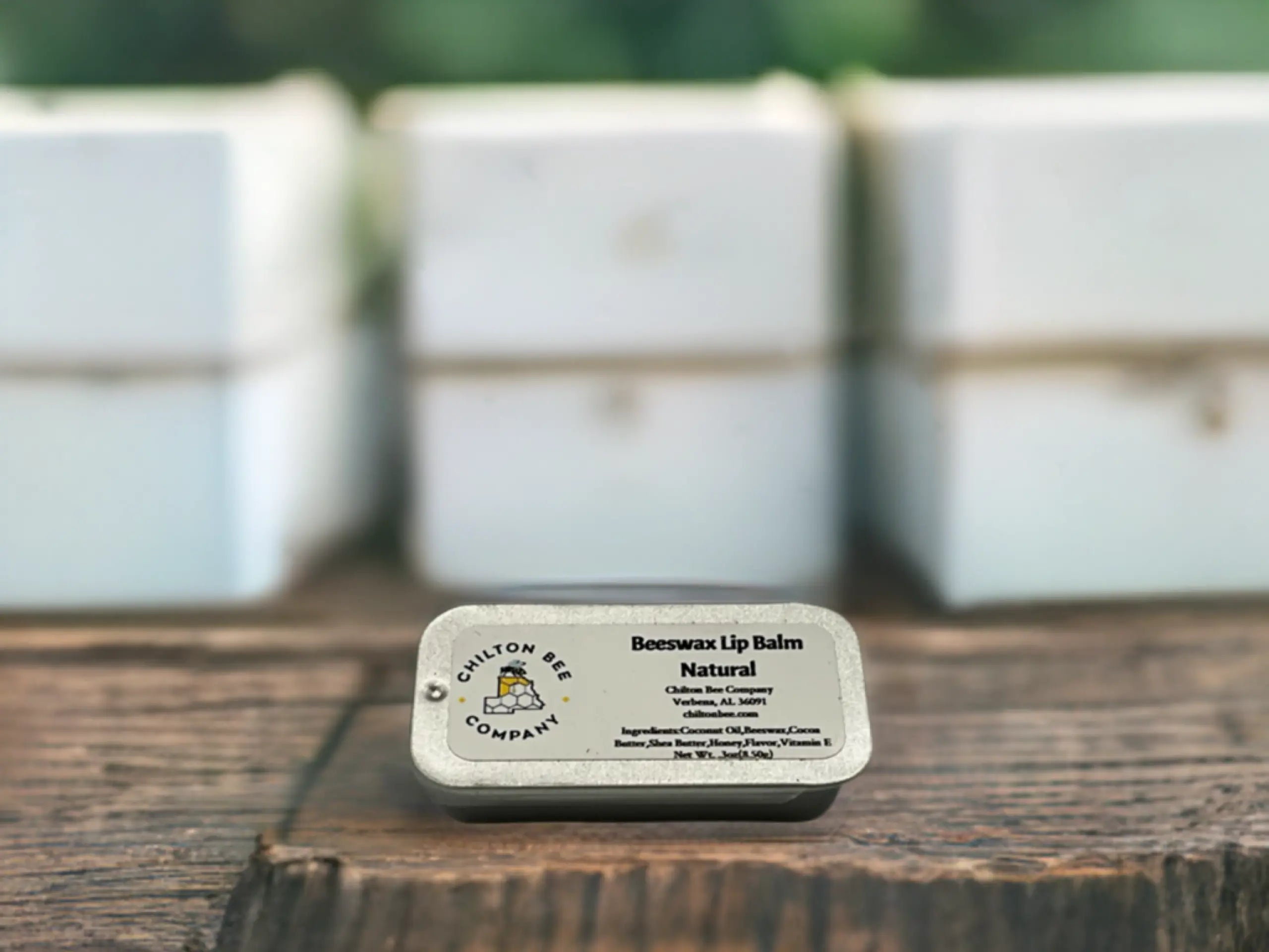 Chilton Bee Company beeswax lip balm tin with natural ingredients: Coconut oil, beeswax, cocoa & shea butter, honey, flavor, Vitamin E.
