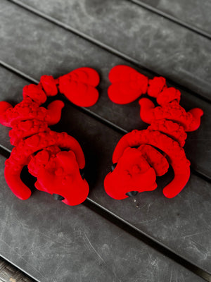 Two Red Dragon Toys