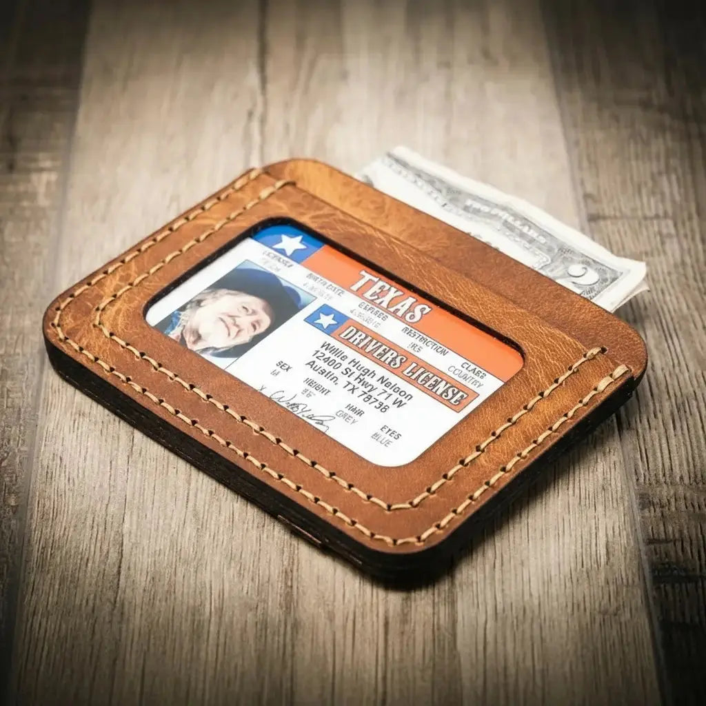 Brown leather wallet holding a Texas driver's license and cash.
