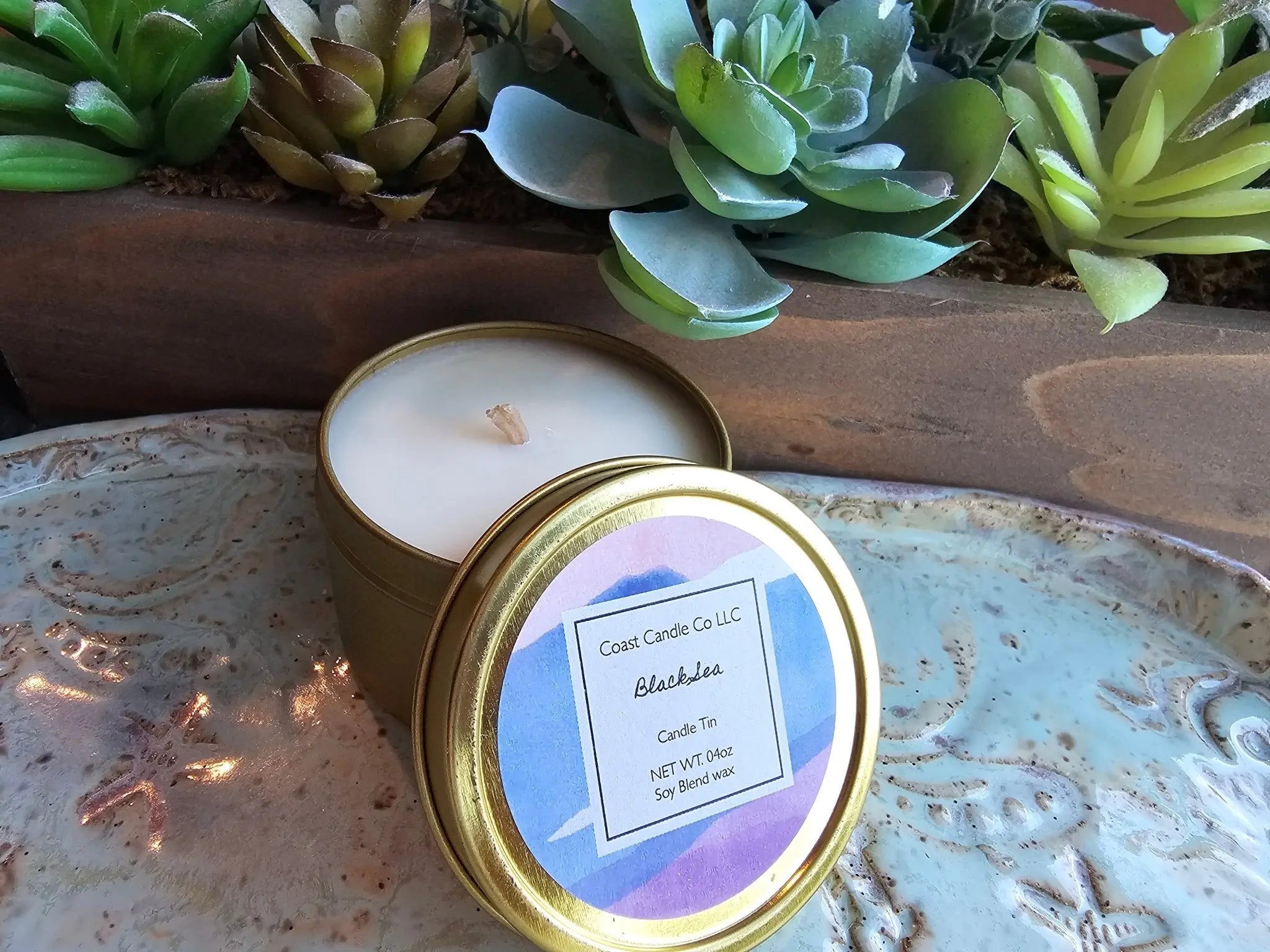 Coast Candle Co Black Sea Soy Candle Tin. Artisanal scented soy blend wax candle in decorative gold tin.