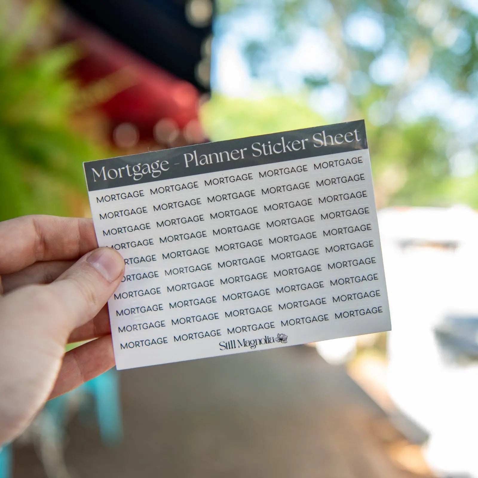 Mortgage planner stickers with "Mortgage" text in a grid pattern.