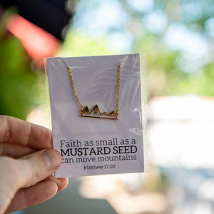 Gold mountain line necklace with mustard seed scripture card