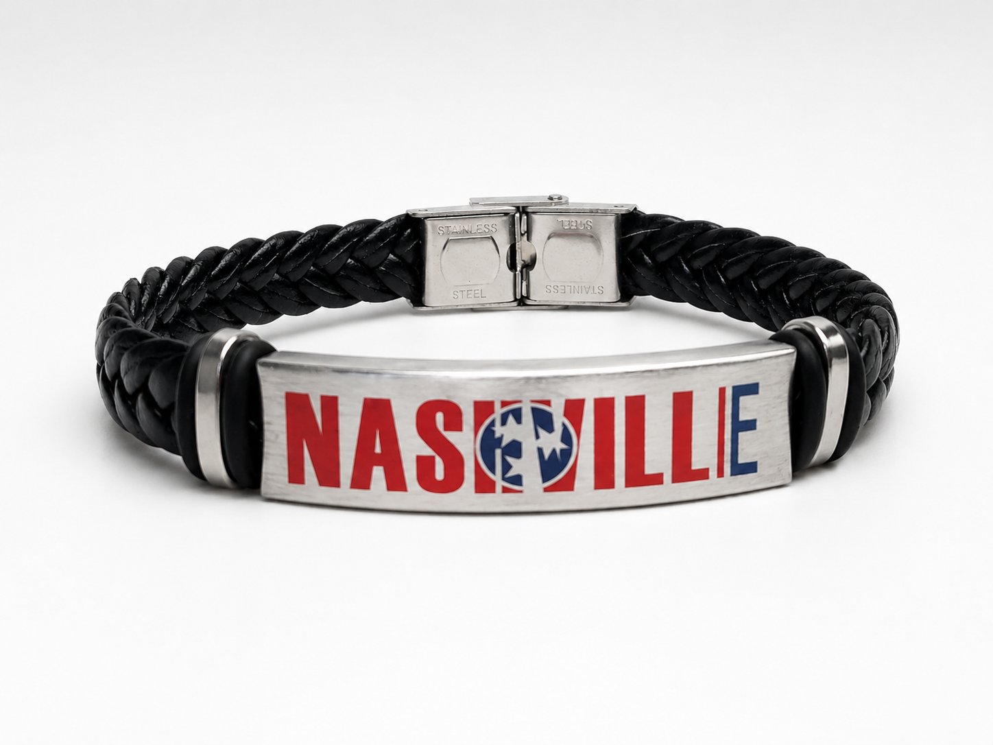 Black braided leather bracelet with a metal tag displaying 'NASHVILLE' on a white background