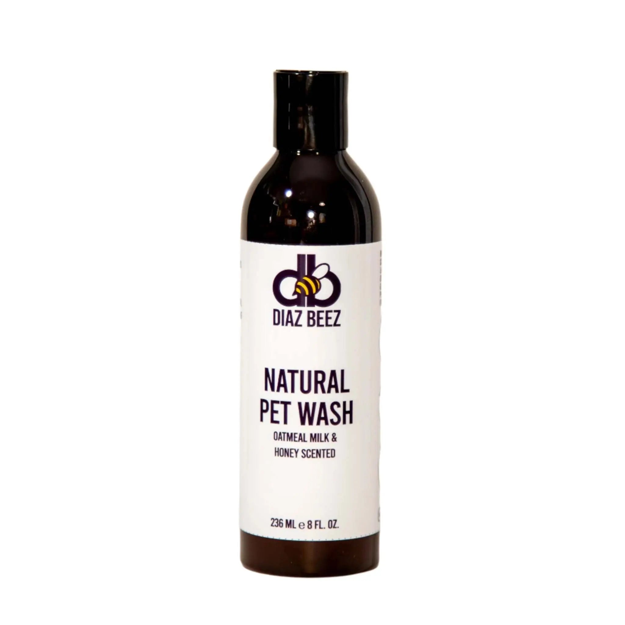 Diaz Beez Natural Pet Wash bottle: Oatmeal Milk & Honey scented, 236ml. A white label with black text on a dark brown bottle.