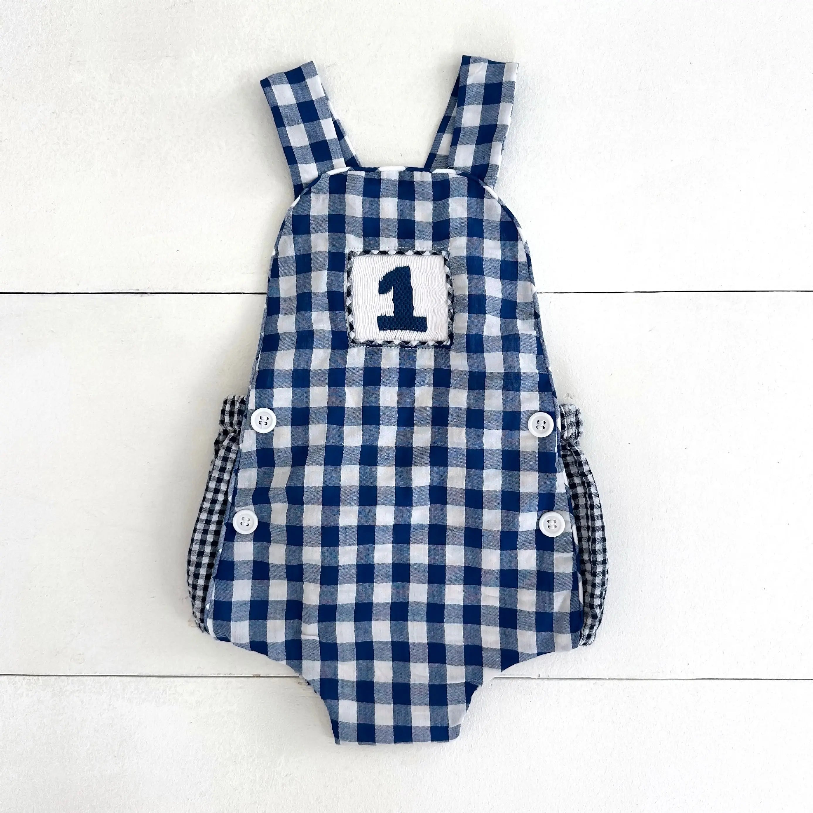 Navy Blue Smocked First Birthday Sunsuit Seven Lantern Lane