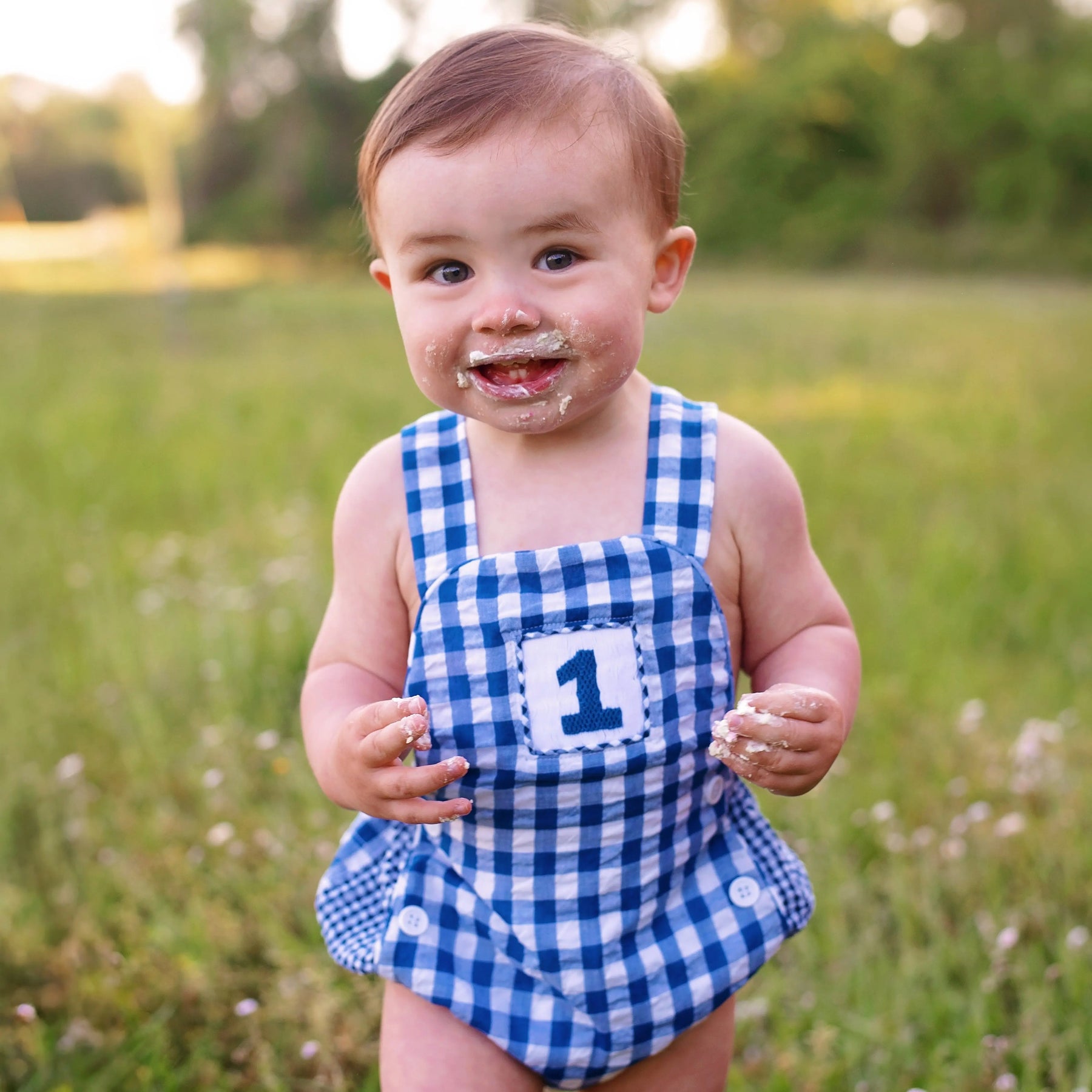 Navy Blue Smocked First Birthday Sunsuit by Seven Lantern Lane, children's boutique clothing detail photo 3