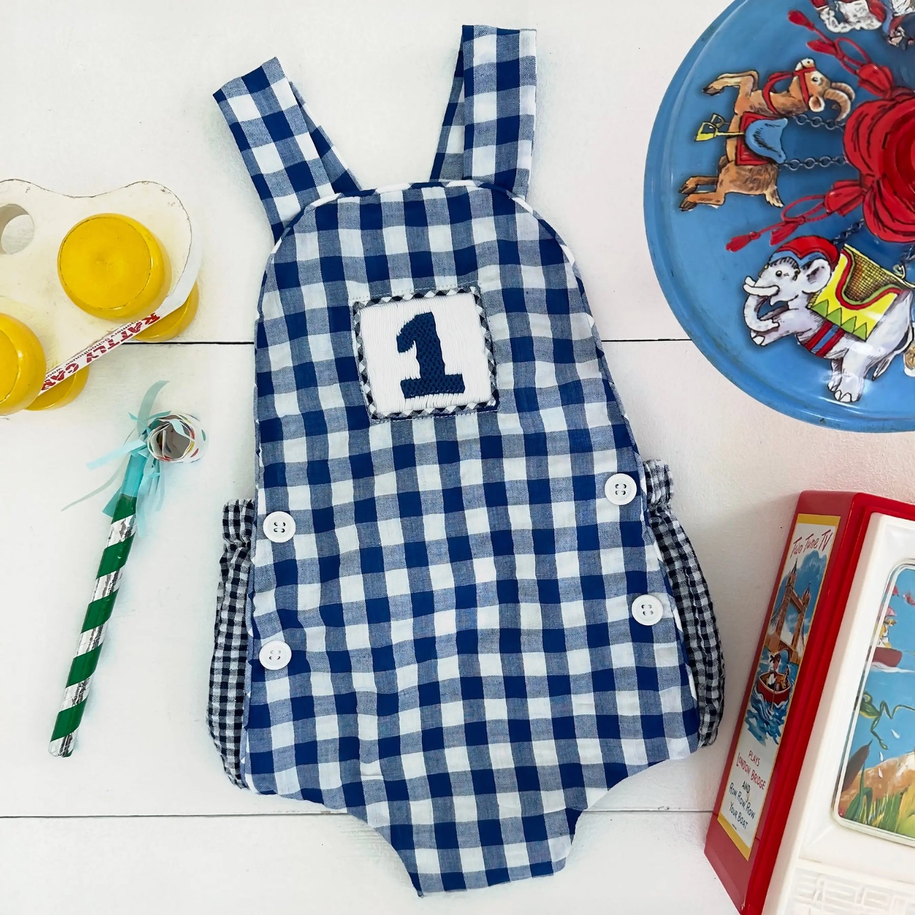 Navy Blue Smocked First Birthday Sunsuit by Seven Lantern Lane, children's boutique clothing detail photo 11