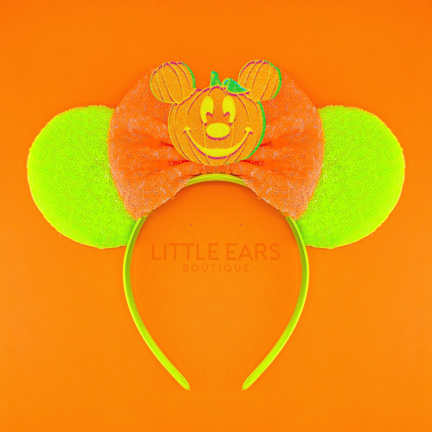 Neon Pumpkin Ears by Little Ears Boutique, travel planning service main product photo