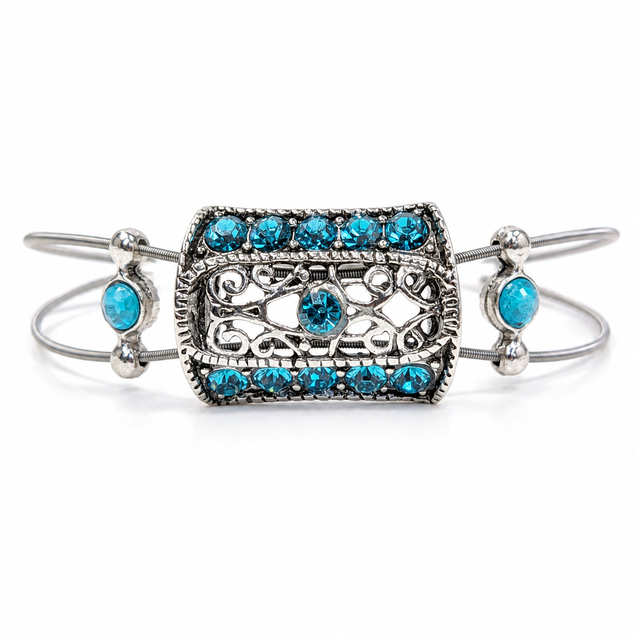 Silver bracelet with turquoise gemstones on a white background
