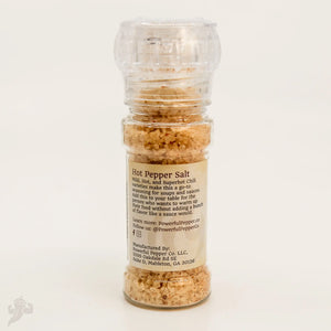 Hot Pepper Salt grinder filled with coarse salt and red chili flakes.