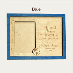 Personalized wooden couple frame with a love quote, space for a 4x6 photo, and a blue outer frame.