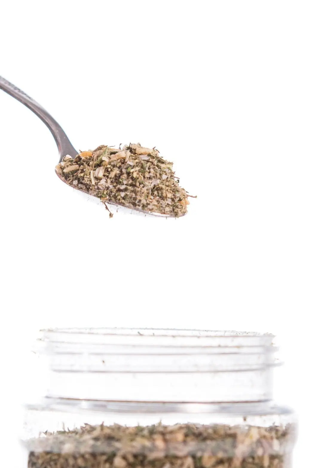 Spoonful of Poultry Blend Southern-Style Seasoning Ready to Enhance Your Chicken Dishes