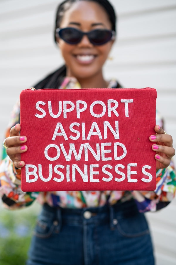 The Support Asian Owned Businesses Clutch by TheTinyTassel, handmade leather goods detail photo 2