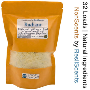 Radiant laundry detergent by NonScents in a gold pouch showing detergent granules.