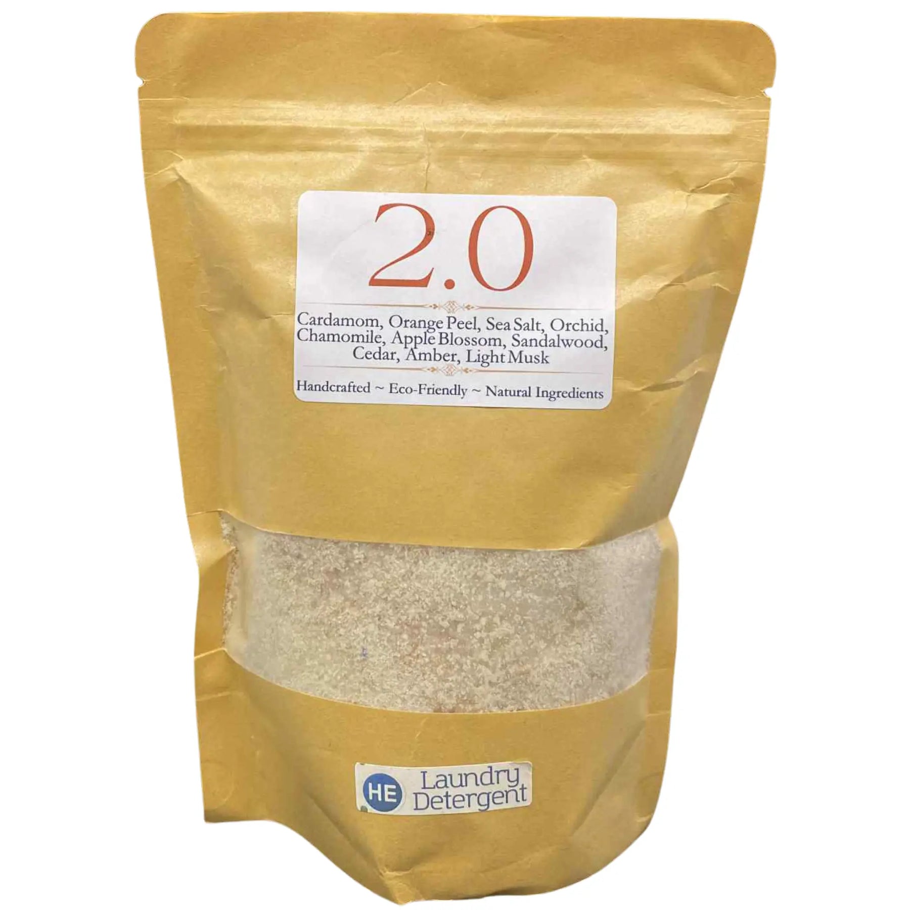 Brown bag of 2.0 scented HE laundry detergent by Main Street Collective, with ingredient list and transparent window showing product.