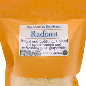 ResilScents Radiant laundry detergent in orange packaging, a citrus scented blend of orange and pink grapefruit for 16 ounces.