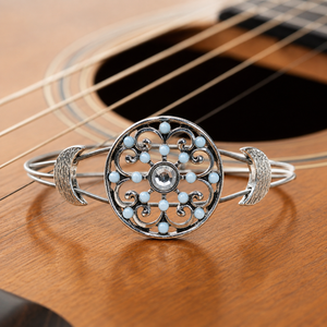 Light blue and silver guitar string bracelet