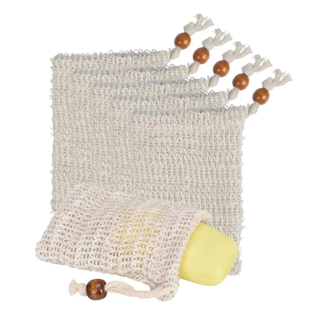 Sisal soap bags with wooden beads, including a bag containing a bar of yellow soap, for gentle skin exfoliation.