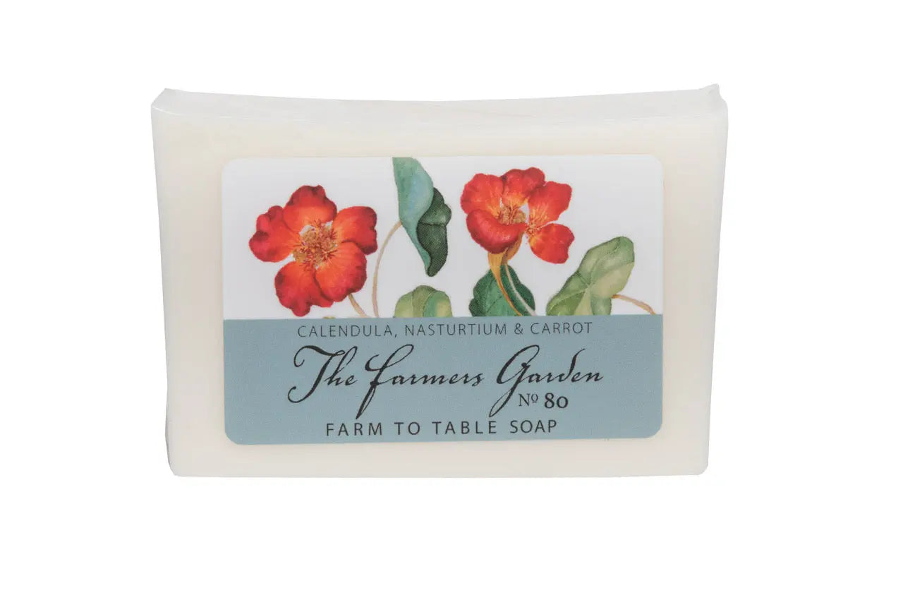 The Farmers Garden Farm to Table Soap slice with calendula, nasturtium, and carrot illustration