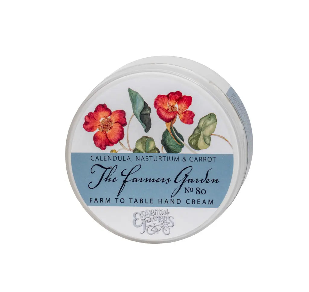The Farmers Garden hand cream with calendula, nasturtium, and carrot illustrations.