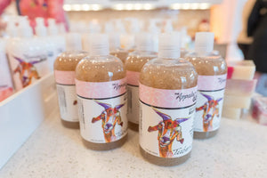 Appalachian Goat Tuberose Exfoliating Body Wash bottles with goat illustrations.