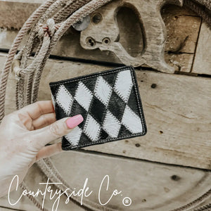 Men's wallet with a black and white diamond cowhide pattern.