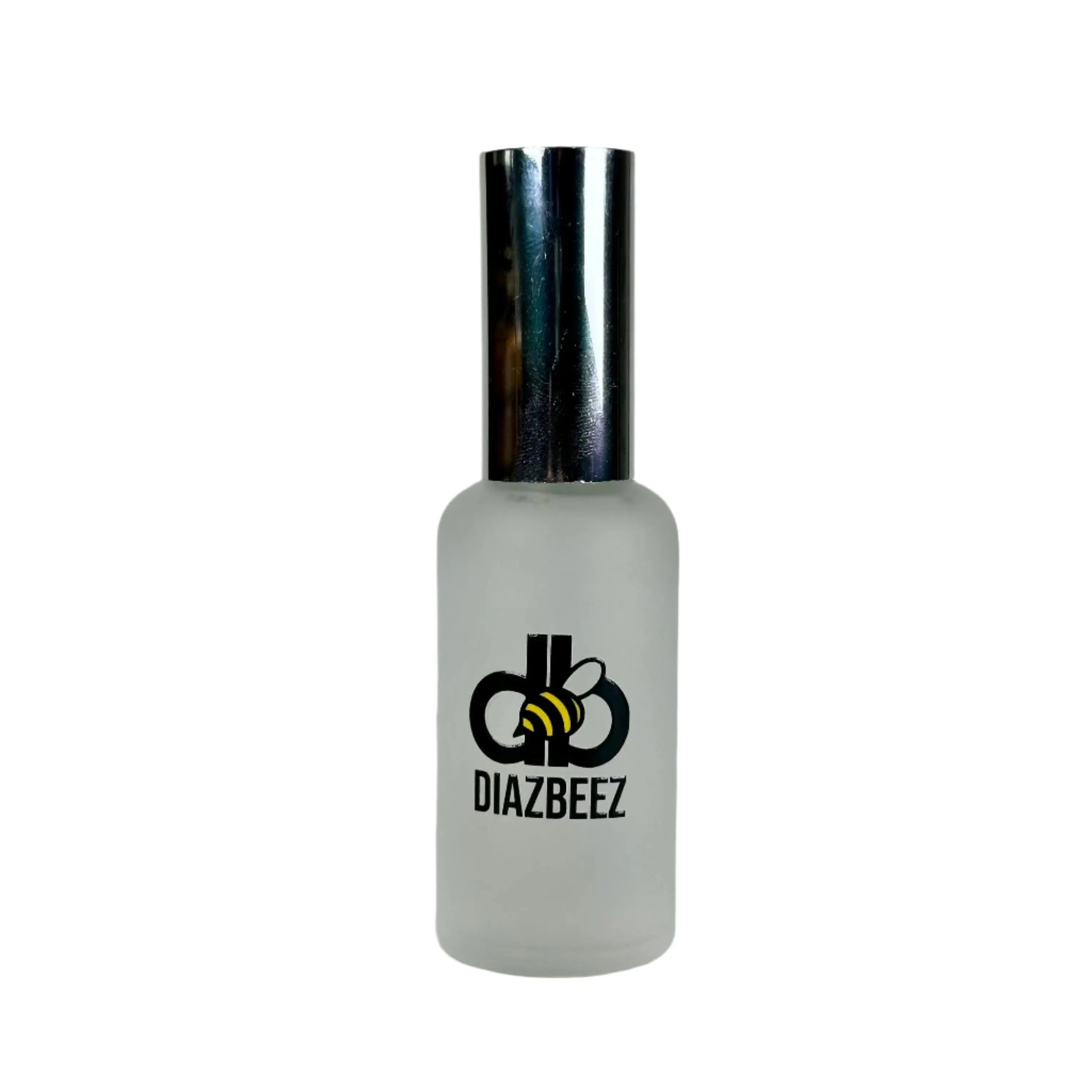 Frosted glass perfume spray bottle with silver cap and Diaz Beez logo.