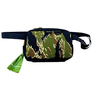 TrailHound fanny pack with tiger stripe camo pattern and dog waste bag dispenser.