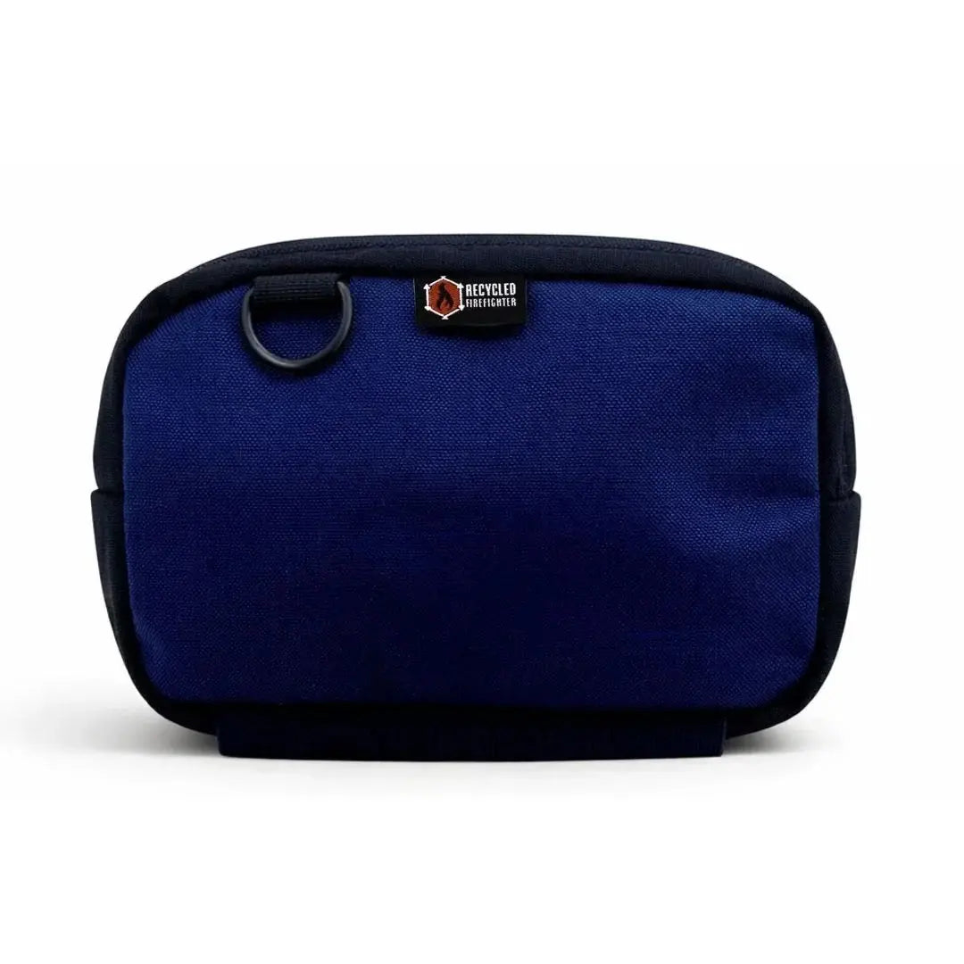 Navy blue fanny pack with Recycled Firefighter logo and D-ring detail.