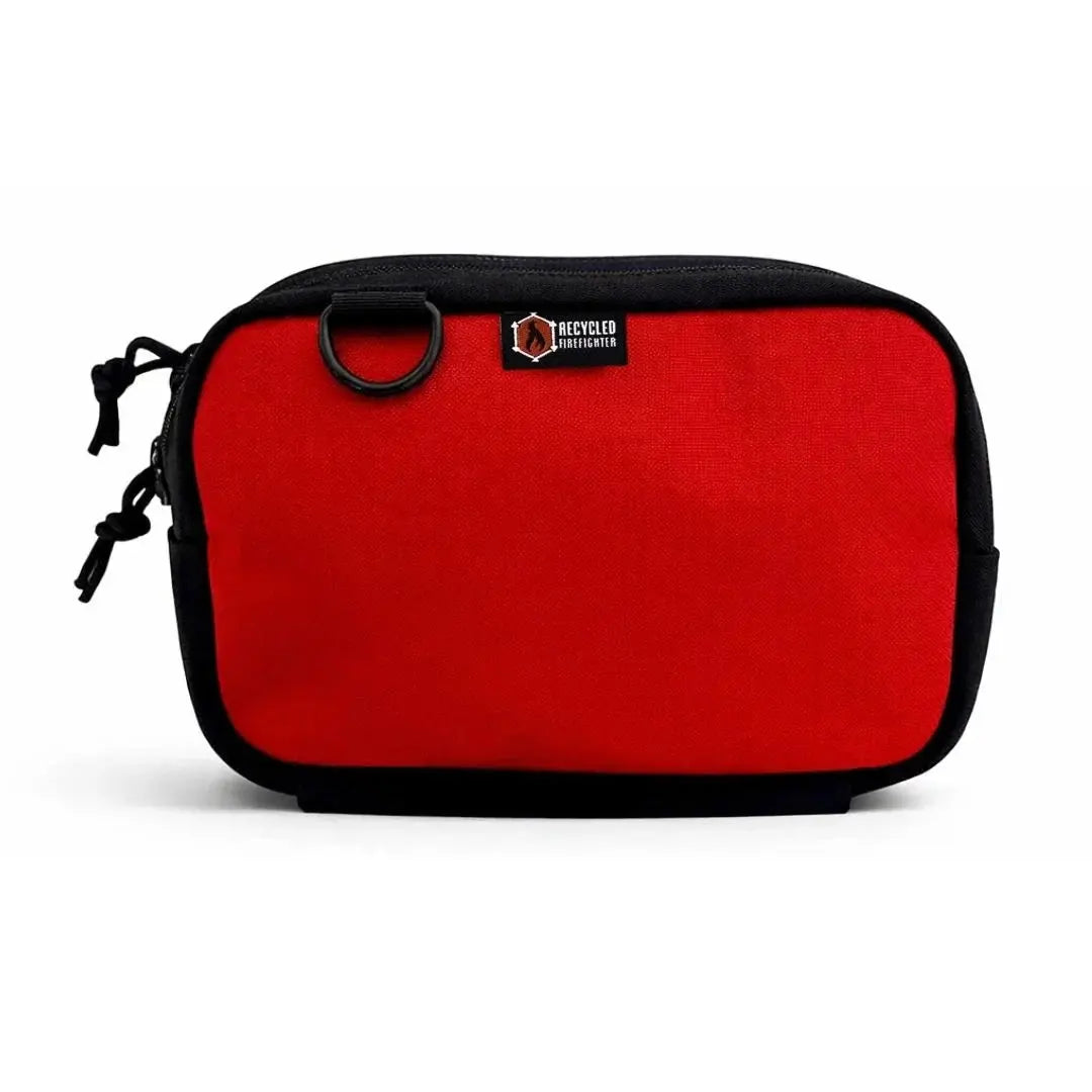 Red fanny pack with black trim and Recycled Firefighter logo