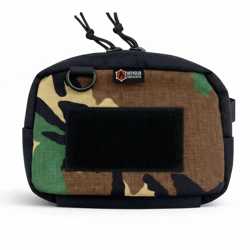 Camouflage fanny pack with black patch and Recycled Firefighter logo.