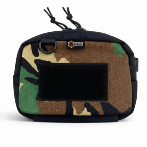 Camouflage fanny pack with black patch and Recycled Firefighter logo.