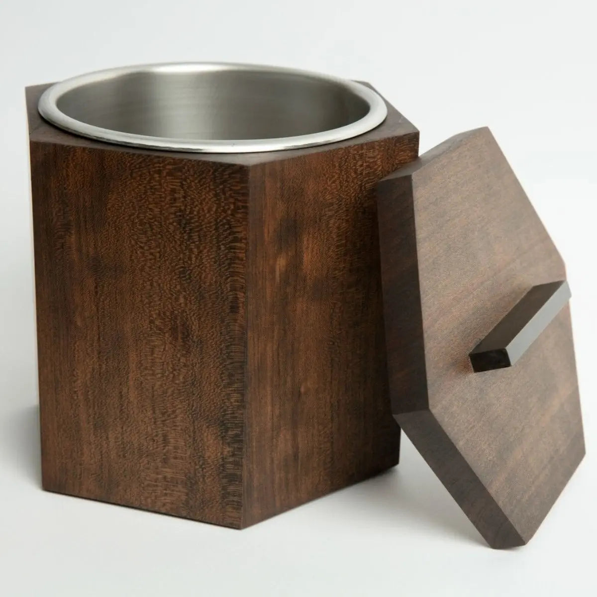 Blackened cherry wooden ice bucket with stainless steel insert, octagonal shape, and wooden lid with handle.