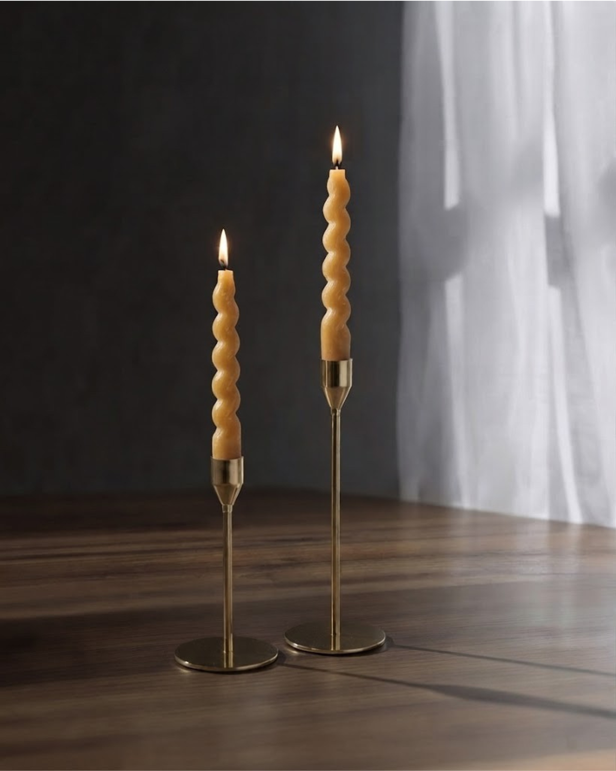 Sculptural swirl taper candles styled for dining table decor