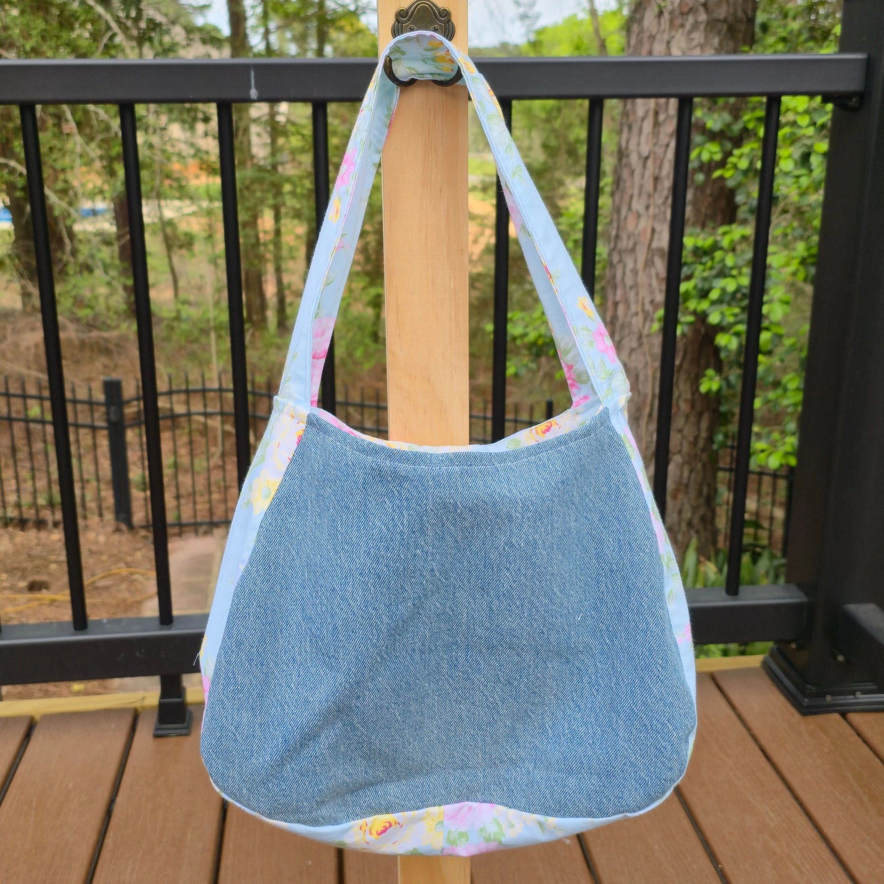 Upcycled Denim Shoulder Bag with Floral Bow, Handmade Denim Purse, Small Hobo Bag by Maypop House Designs, handmade leather goods detail photo 4