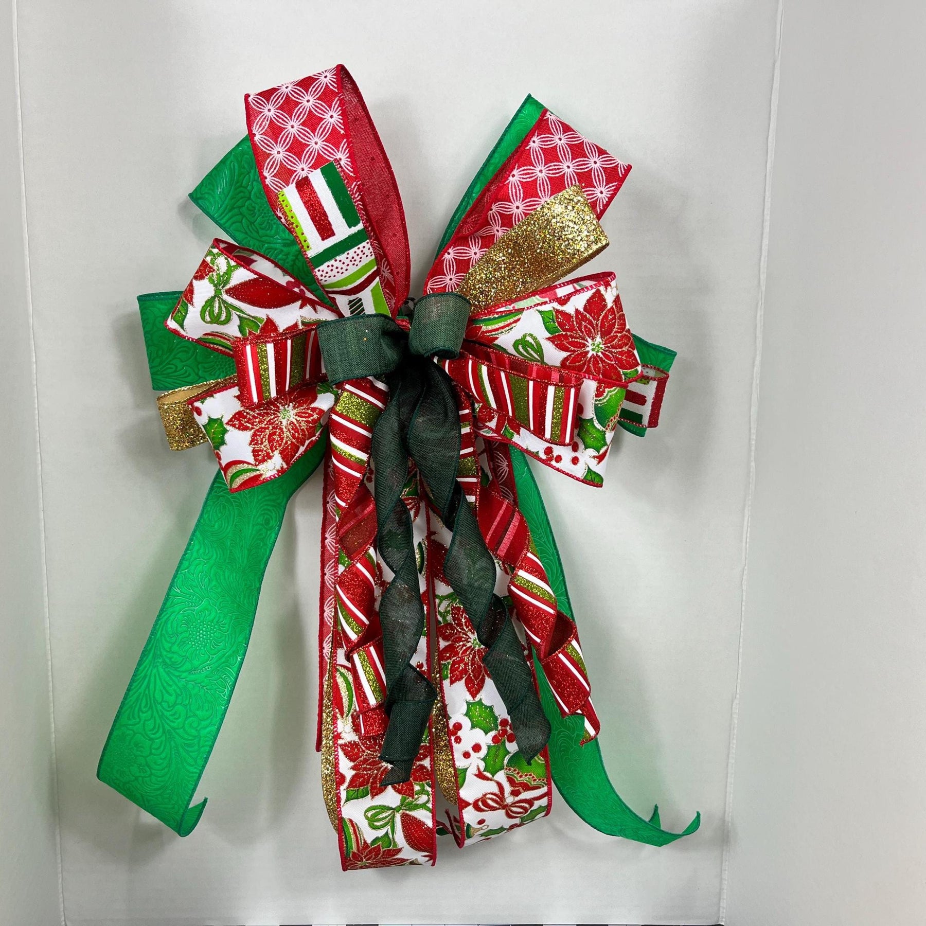 Christmas Poinsettia Bow | Red, Green & Gold Tree Topper by Bouge Creations, view 4