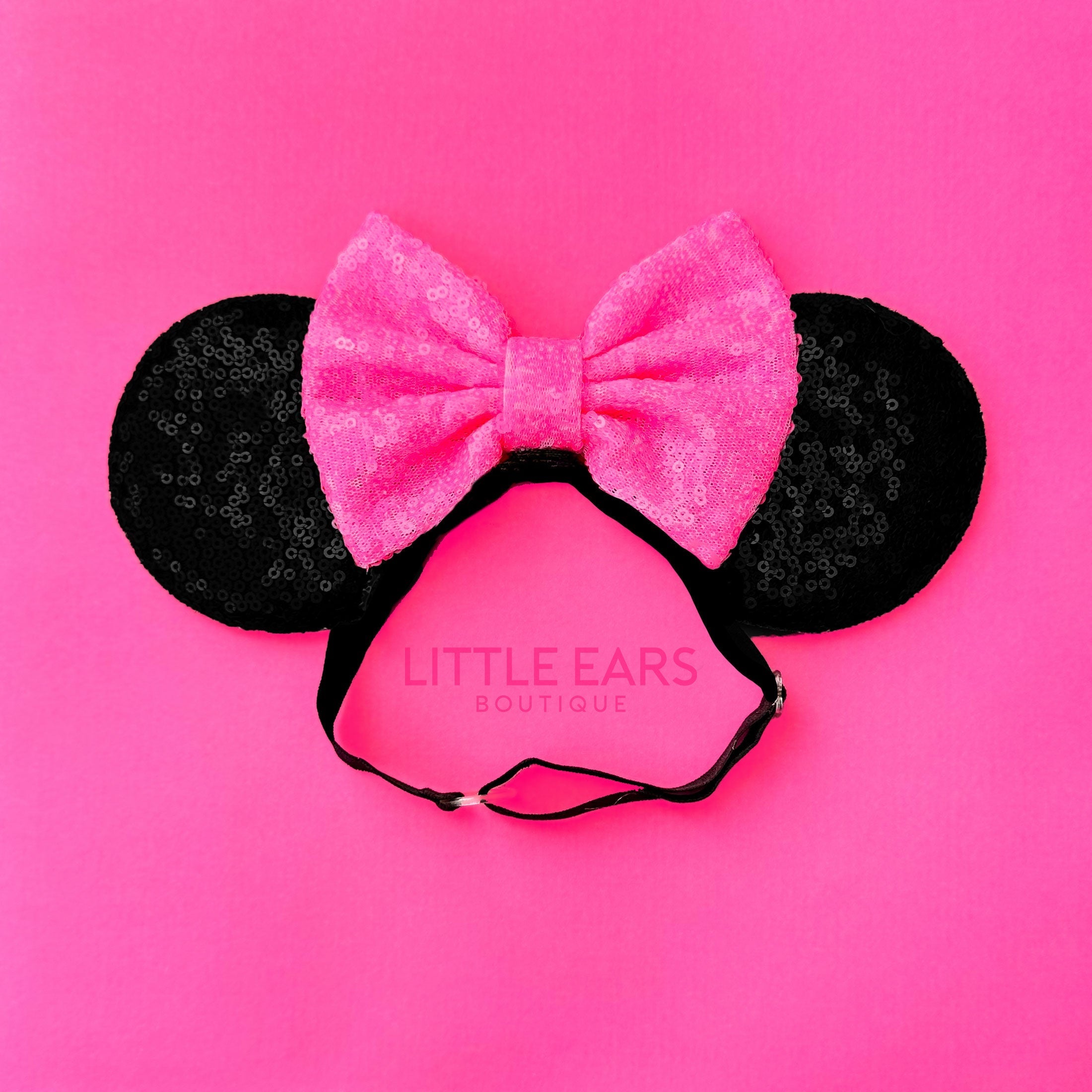 Black and hot pink elastic baby theme park ears by Little Ears Boutique