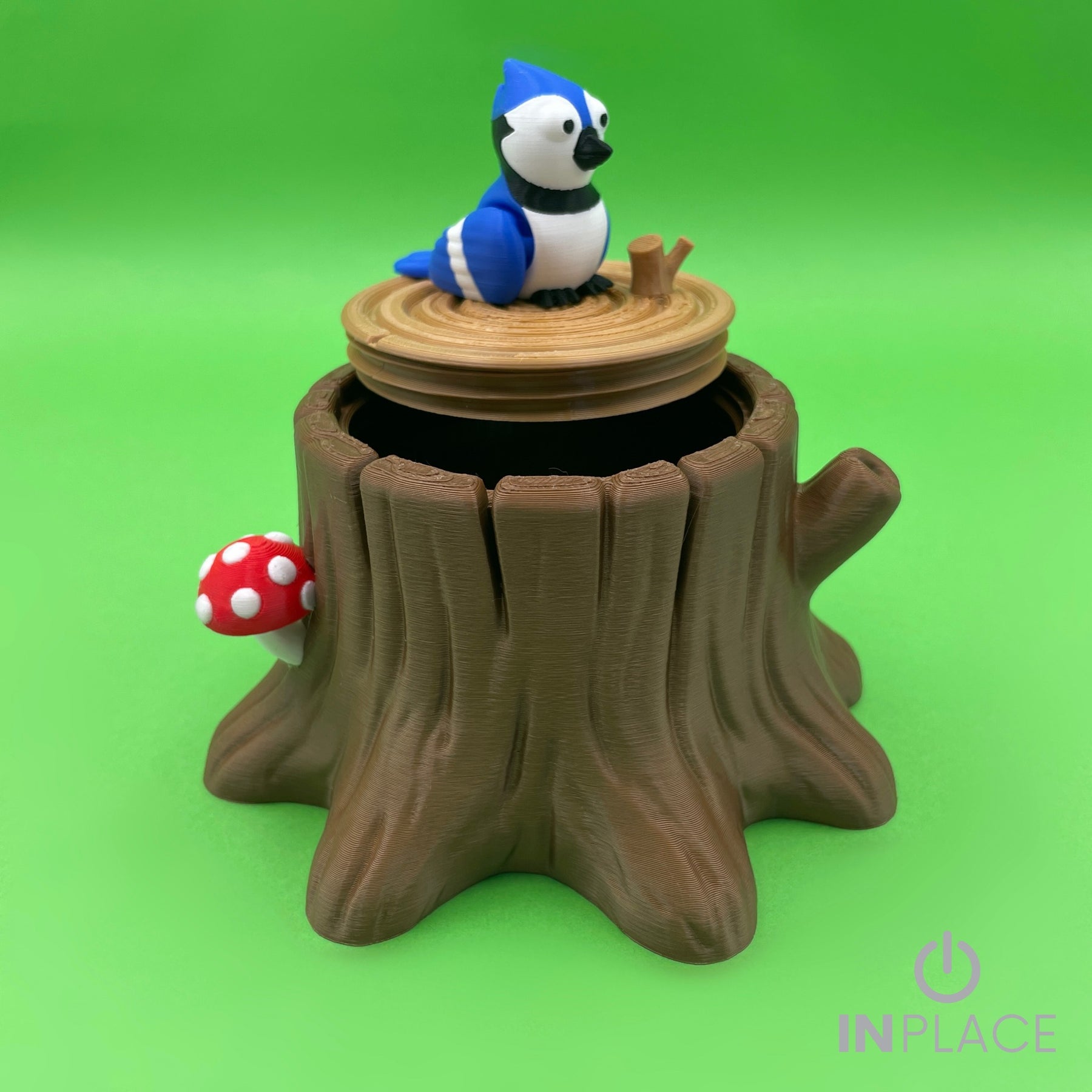 Blue jay tree stump container with removable lid