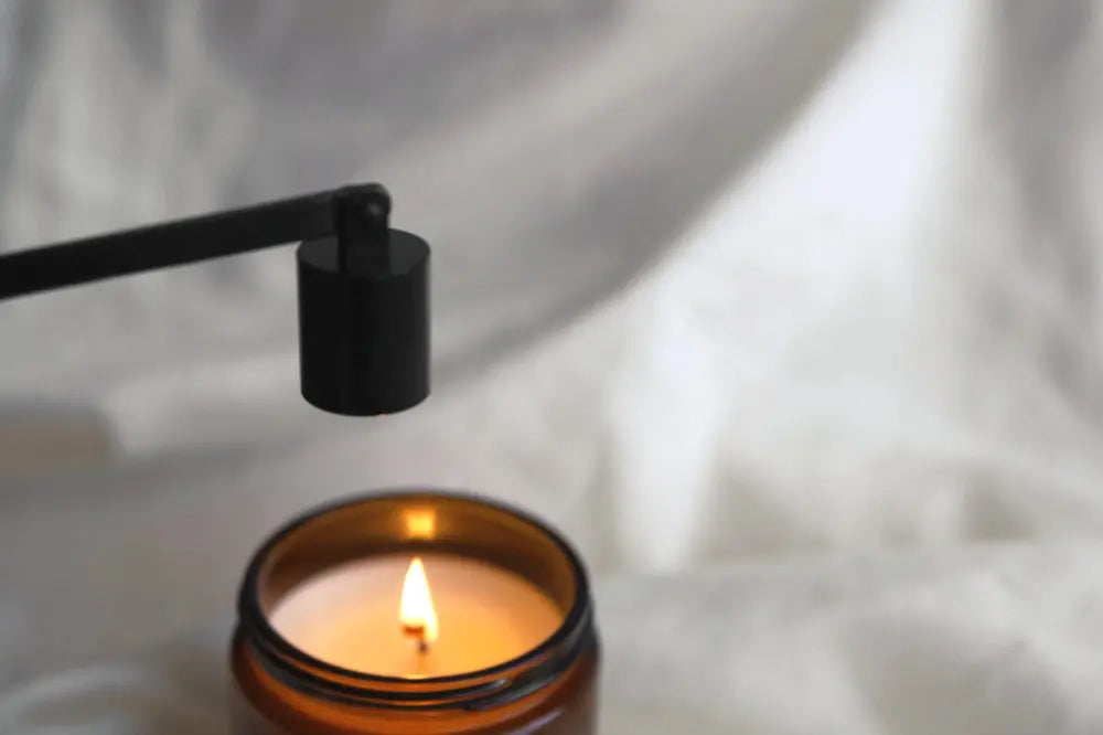 Candle snuffer by gold + ivy, scented candle detail photo 3