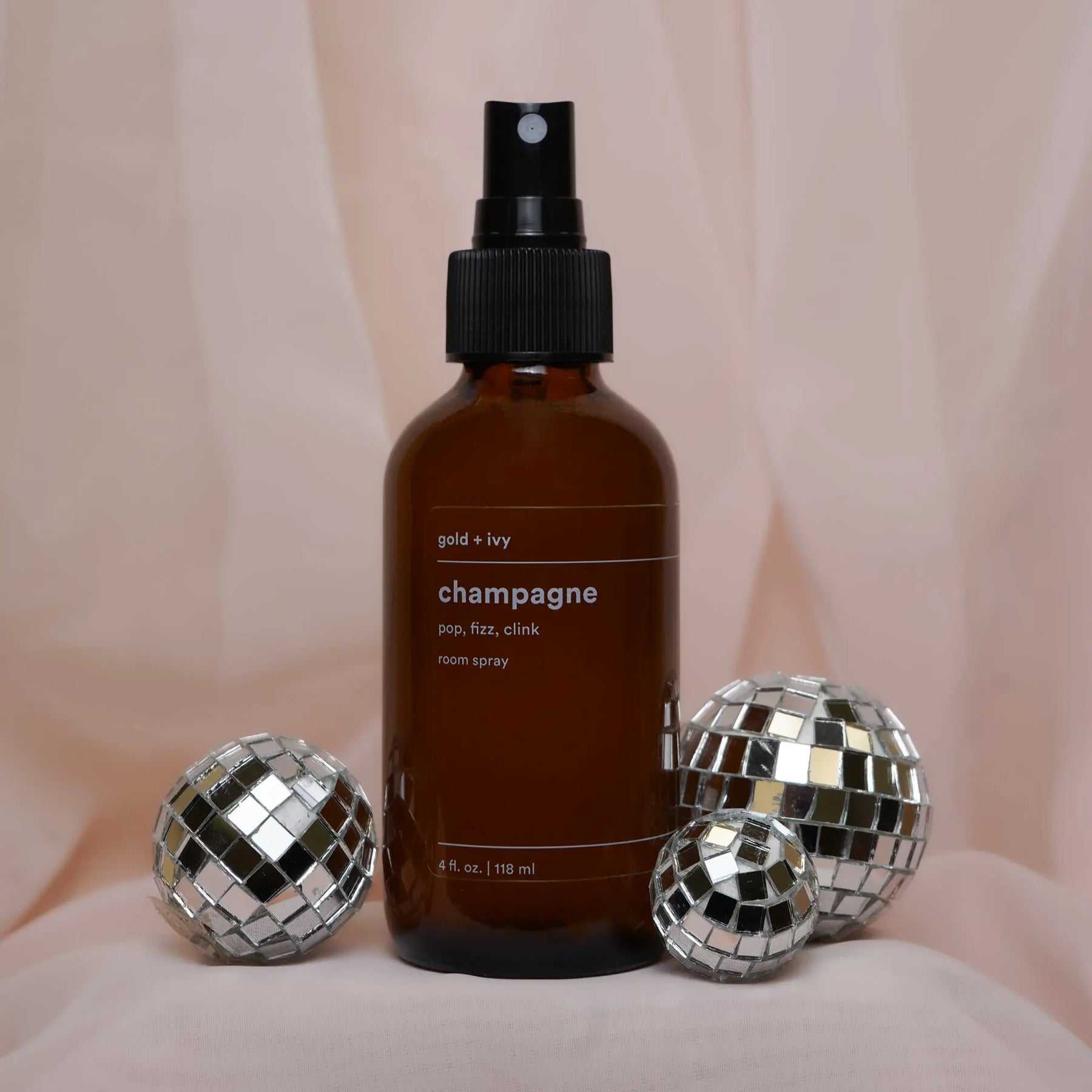 Champagne room spray by gold + ivy, scented candle main product photo